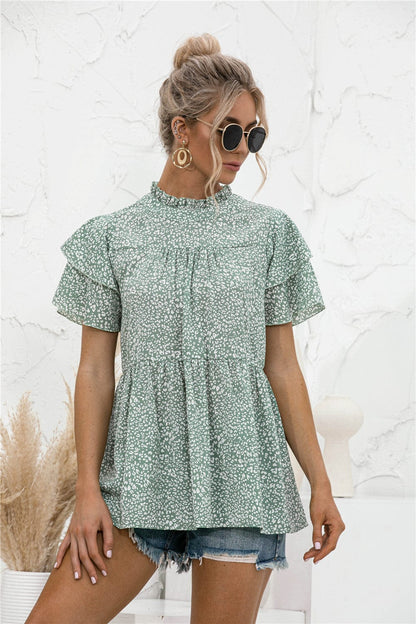 Blusa con mangas escalonadas y estampado animal