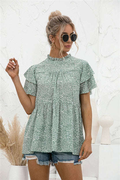 Blusa con mangas escalonadas y estampado animal