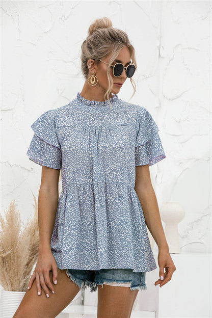 Blusa con mangas escalonadas y estampado animal