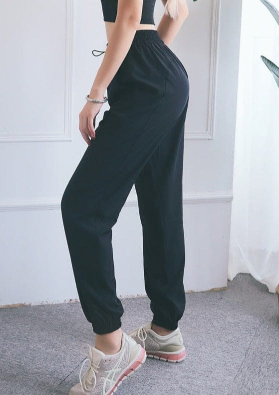 Pantalones de jogging fruncidos con cordón y costuras contorneadas de talle alto