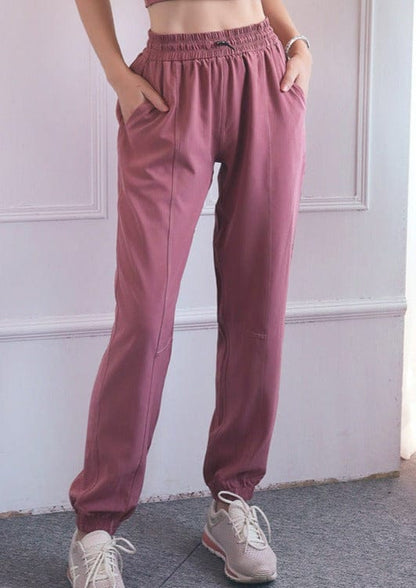 Pantalones de jogging fruncidos con cordón y costuras contorneadas de talle alto