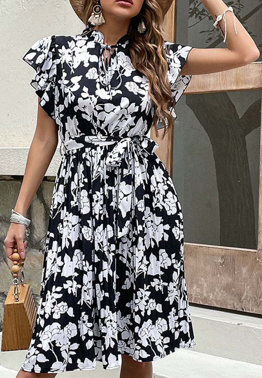 Vestido con cuello anudado y mangas con volantes