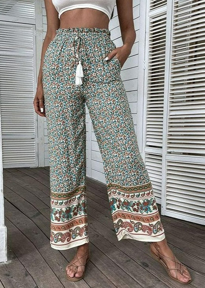 Pantalones bohemios con lazo y borlas 