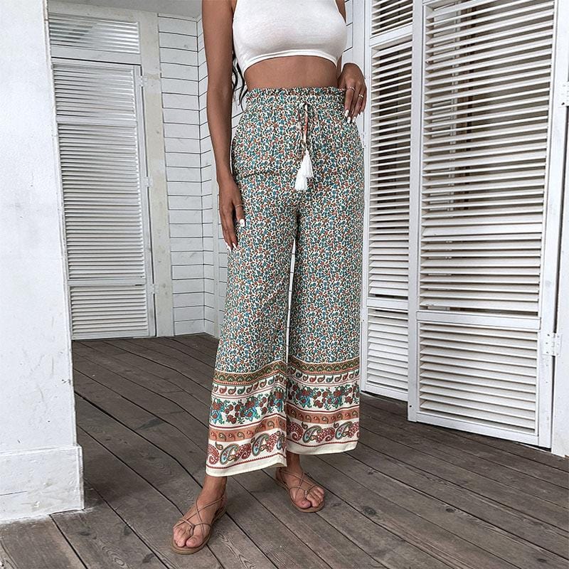 Pantalones bohemios con lazo y borlas 