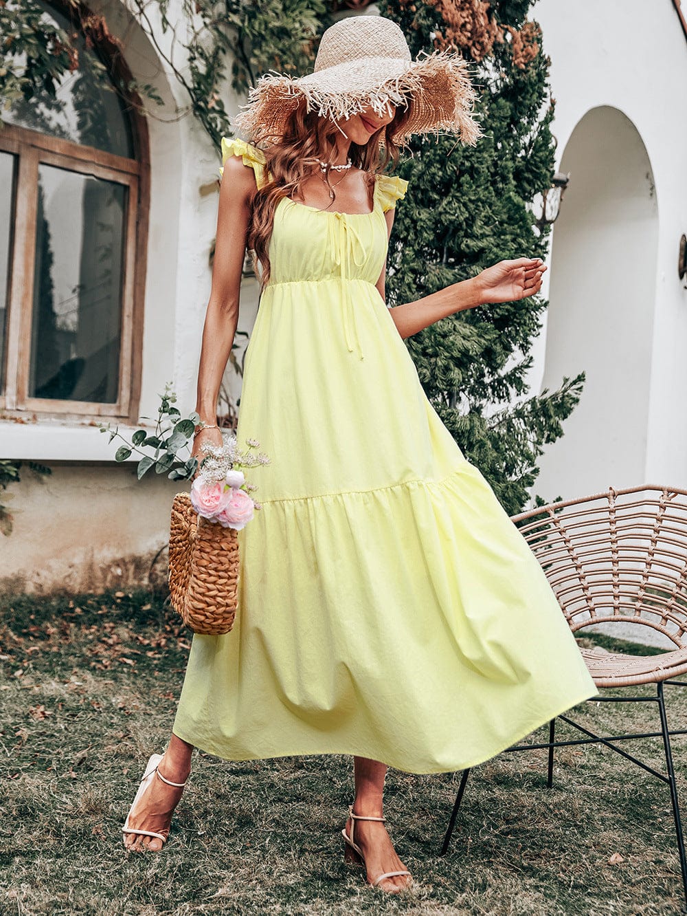 Vestido con tirantes con volantes y detalle de cinta 