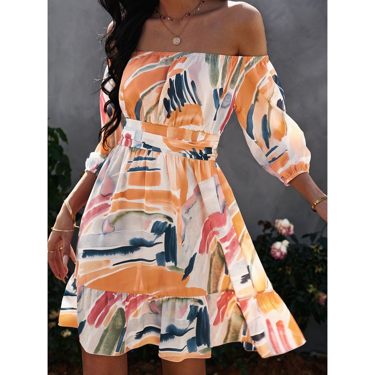 Vestido con lazo en la espalda y estampado abstracto