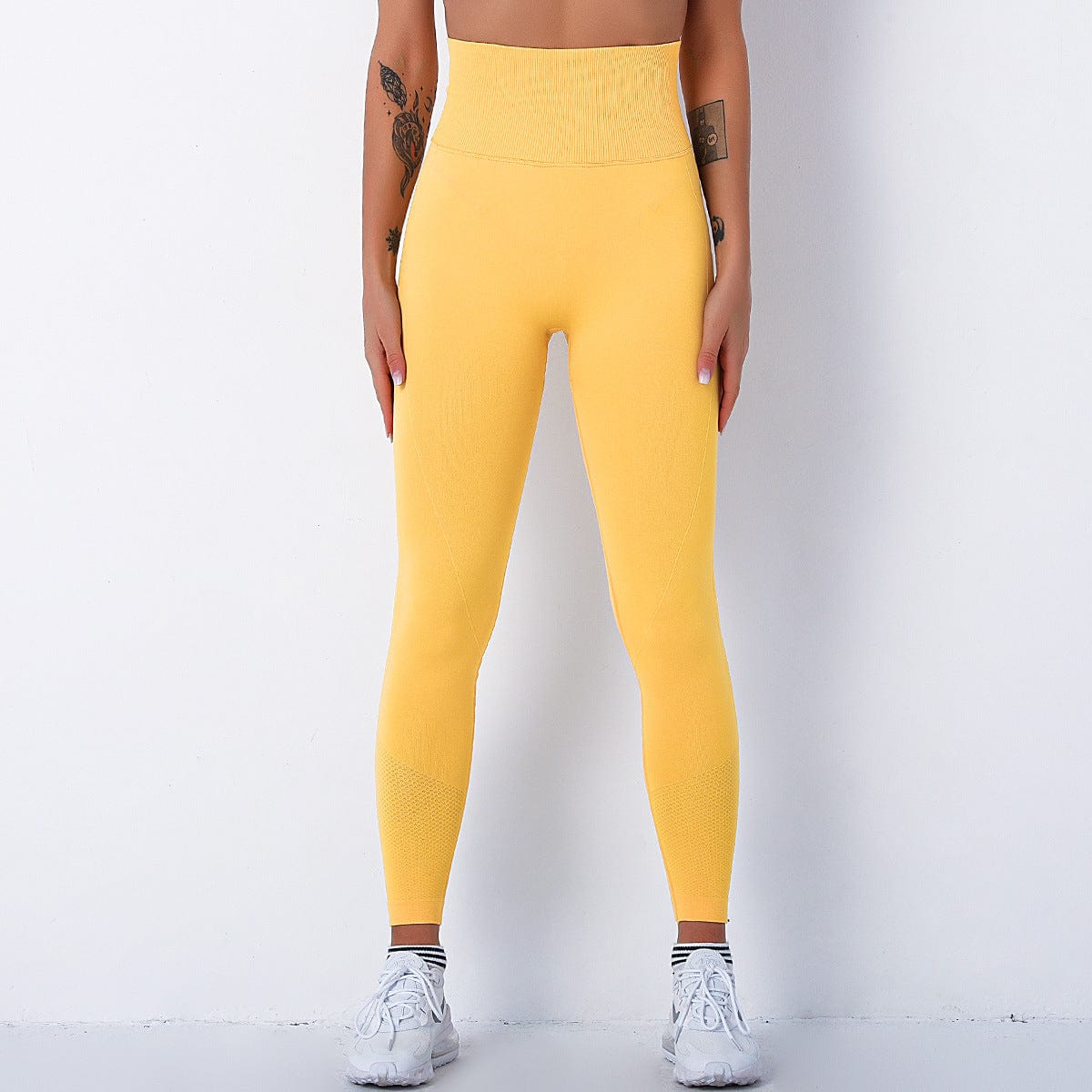 Leggings de tiro alto que modelan los glúteos