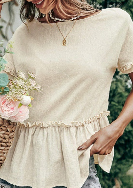 Blusa peplum con volantes texturizados