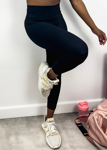 Leggings de cintura alta con diseño cruzado de dos tonos
