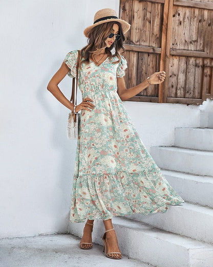 Vestido con estampado floral y mangas abullonadas