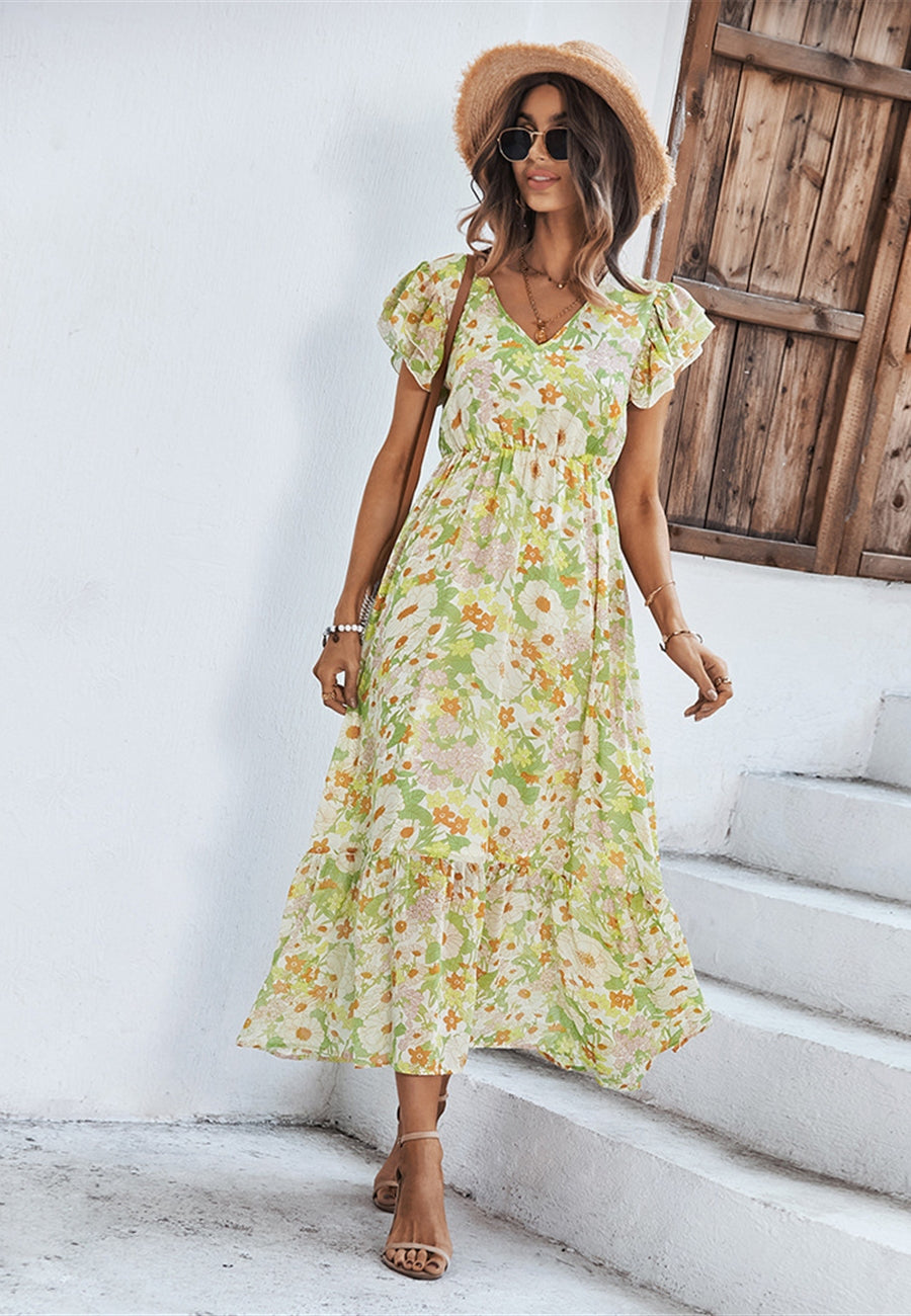 Vestido con estampado floral y mangas abullonadas