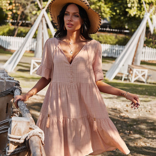 Vestido escalonado con detalle de botones a cuadros