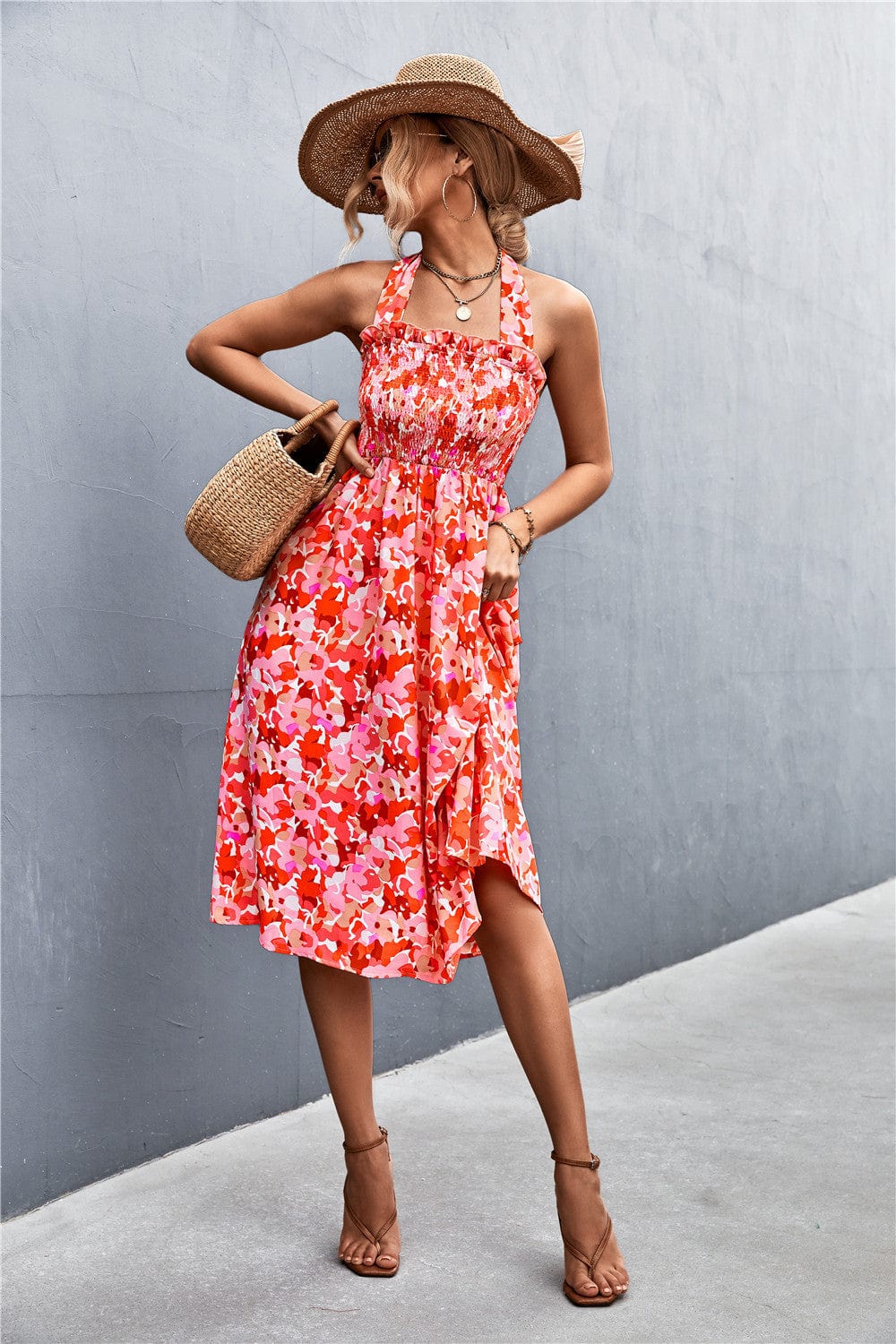 Vestido floral con escote halter y frunces