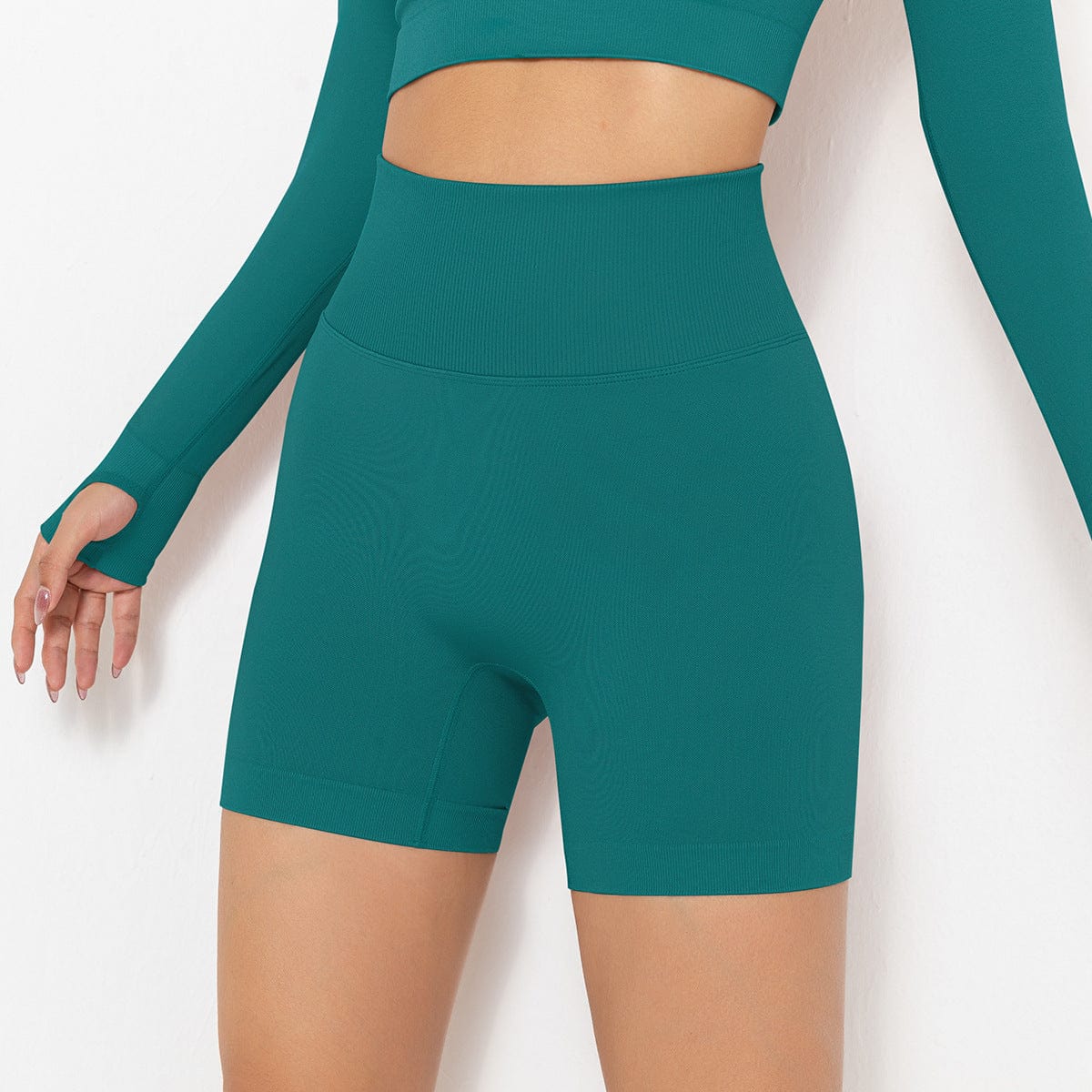 Pantalones cortos de ciclista moldeadores de tiro alto y canalé