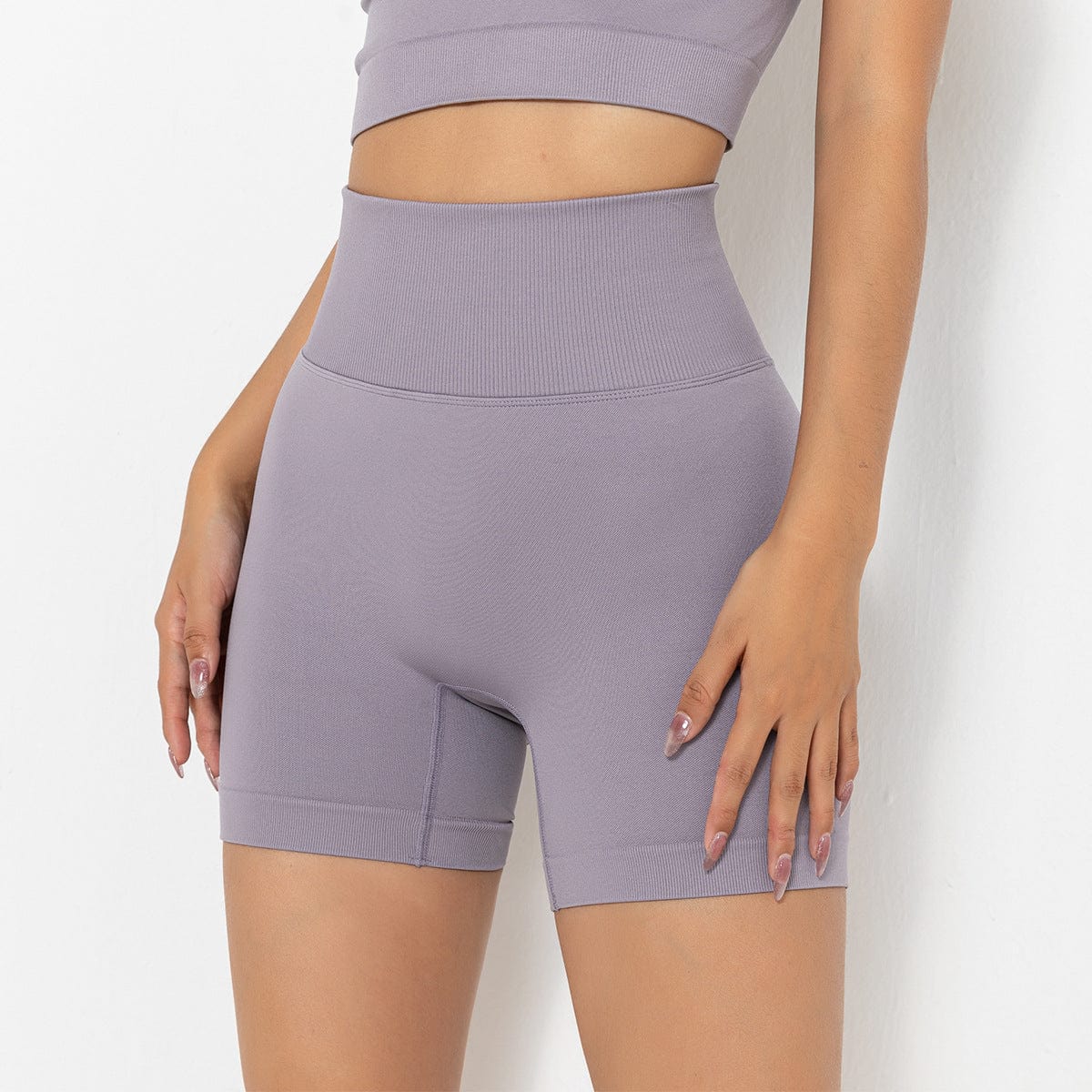 Pantalones cortos de ciclista moldeadores de tiro alto y canalé