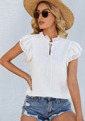 Blusa con volantes y lunares con pinzas