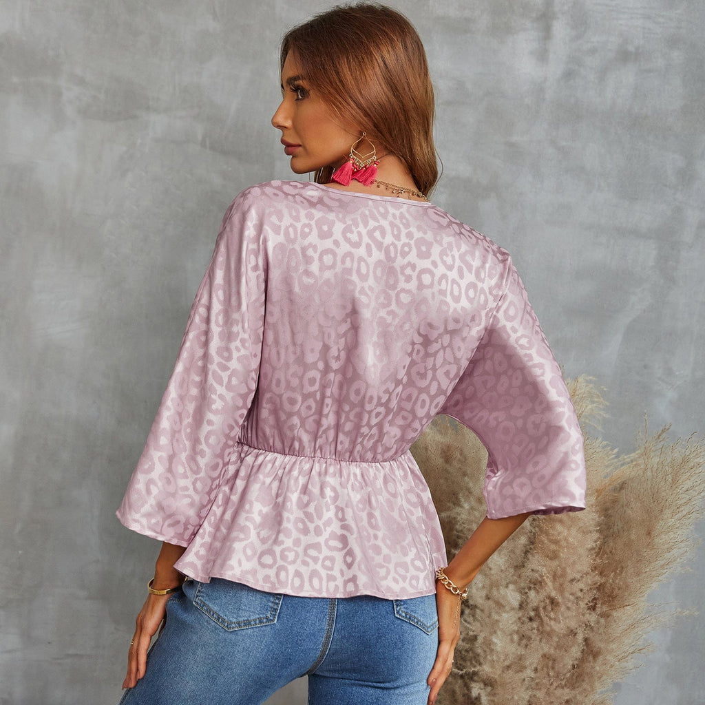 Leopard Surplice Neck Peplum Blouse
