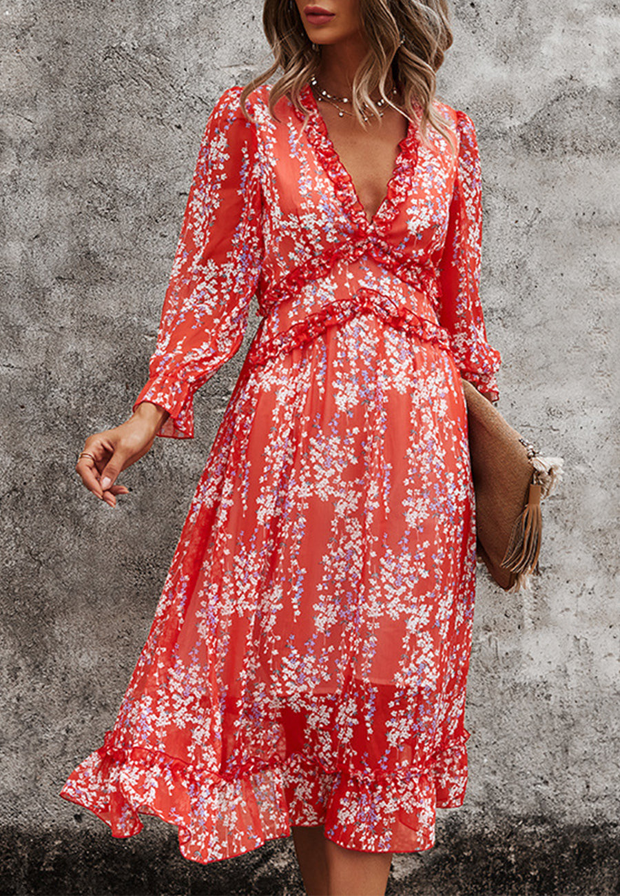 Vestido con escote pronunciado y detalle de volante