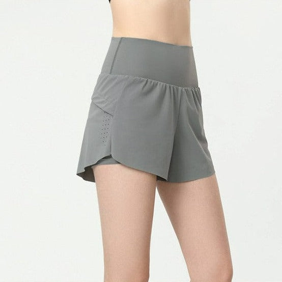 Pantalones cortos deportivos relajados con doble forro