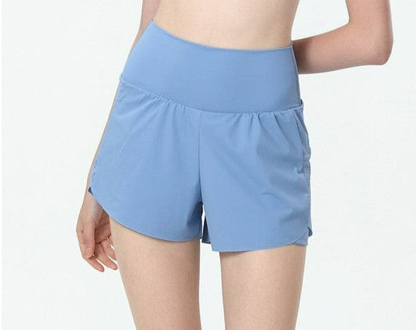 Pantalones cortos deportivos relajados con doble forro
