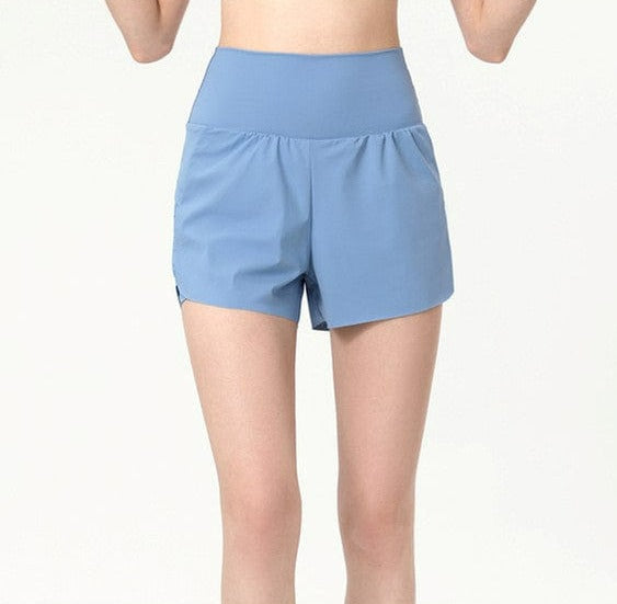 Pantalones cortos deportivos relajados con doble forro