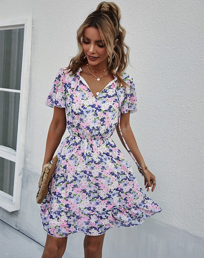 Vestido con cuello anudado y mangas abullonadas