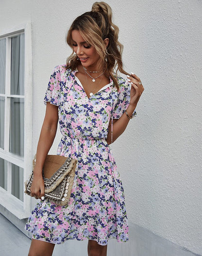 Vestido con cuello anudado y mangas abullonadas