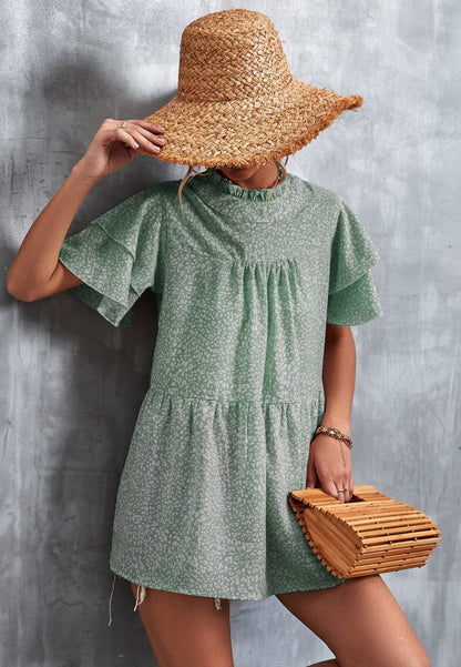 Blusa ligera con volados en el cuello