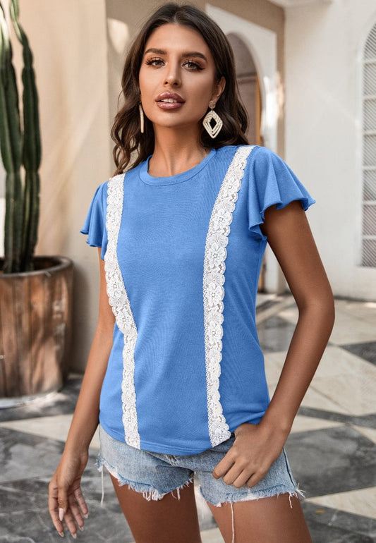 Blusa con mangas abullonadas y ribete de encaje