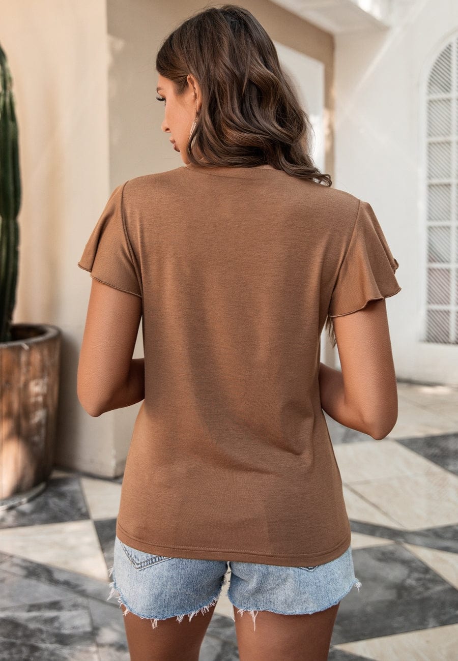 Blusa con mangas abullonadas y ribete de encaje