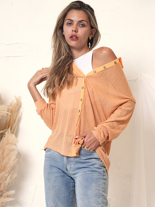 Blusa texturizada con botones y canalé 