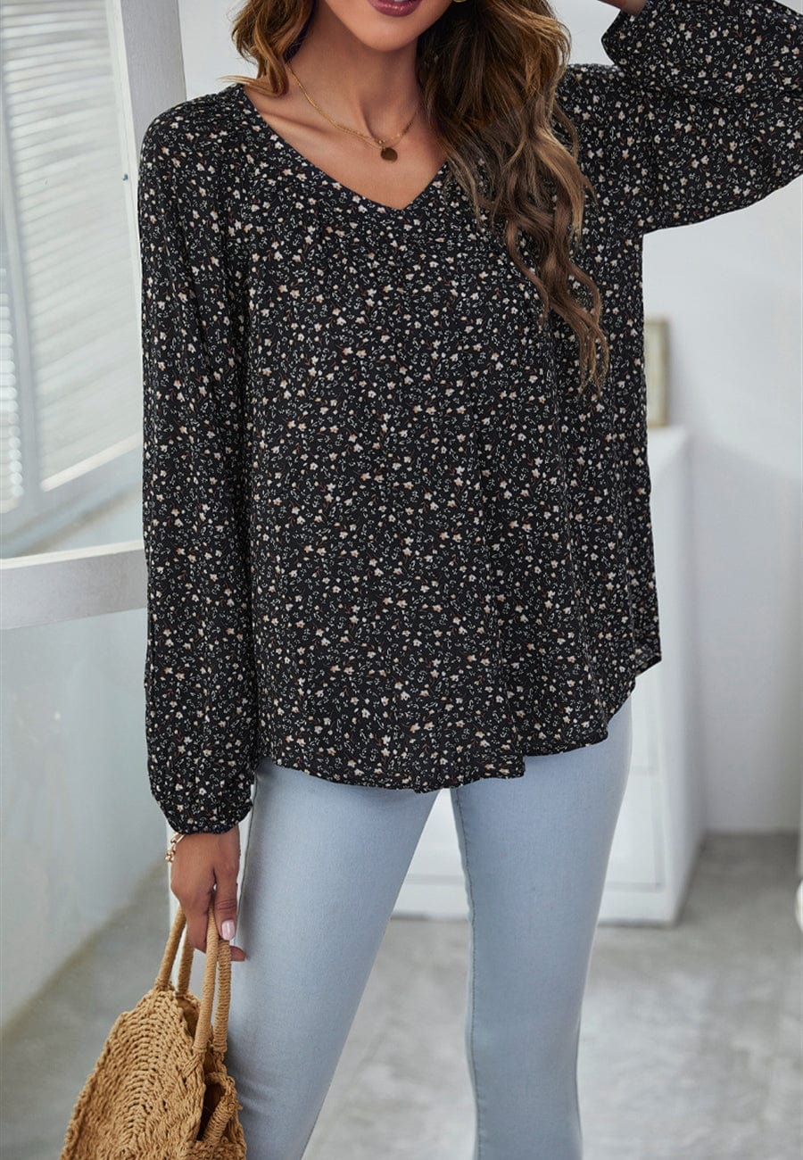 Blusa clásica con escote en V y estampado floral
