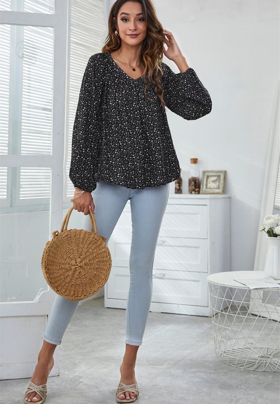 Blusa clásica con escote en V y estampado floral