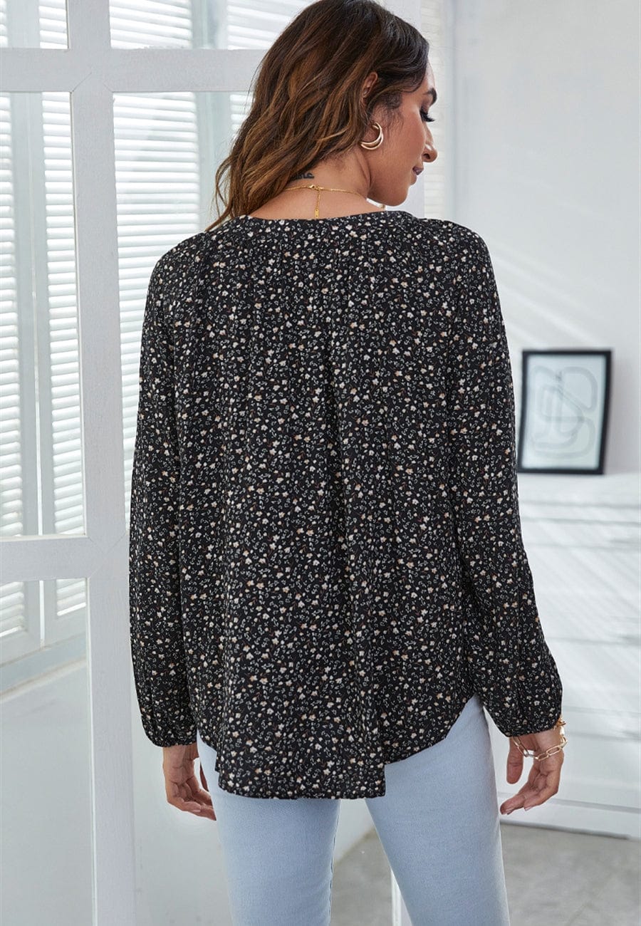 Blusa clásica con escote en V y estampado floral