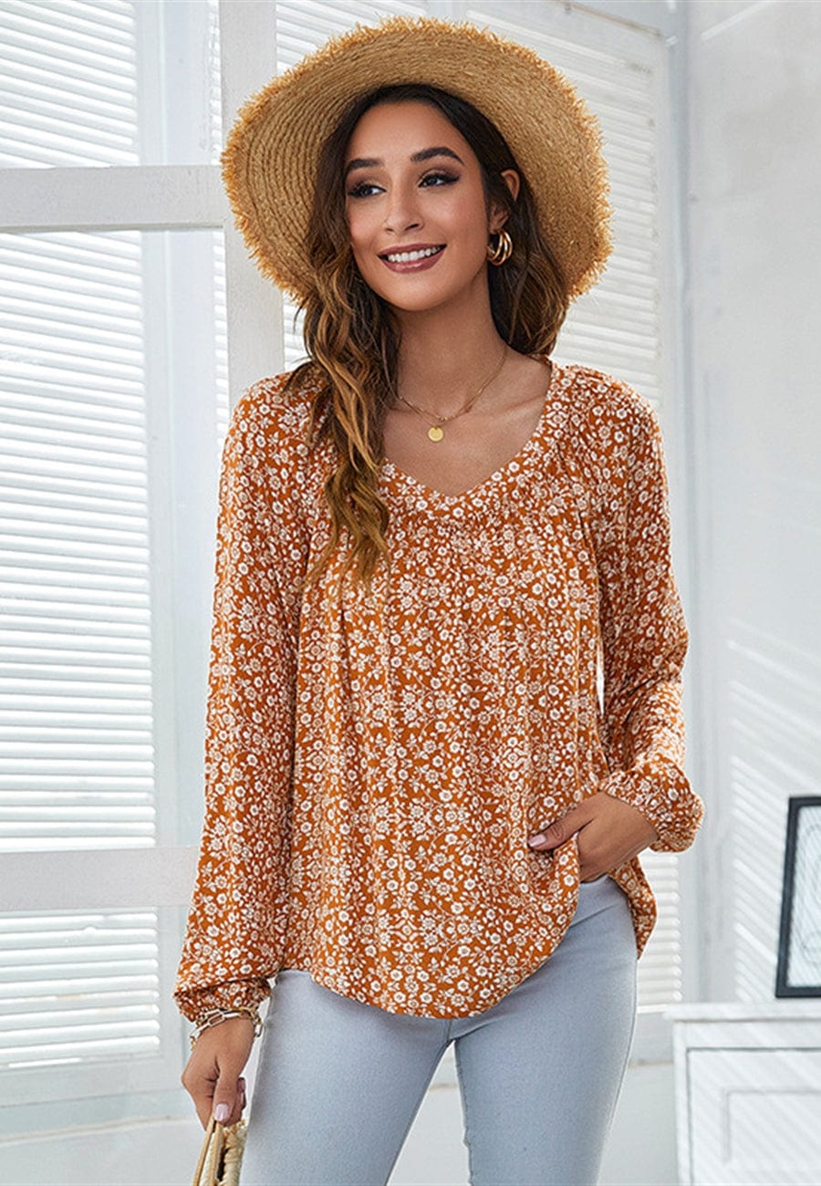 Blusa clásica con escote en V y estampado floral