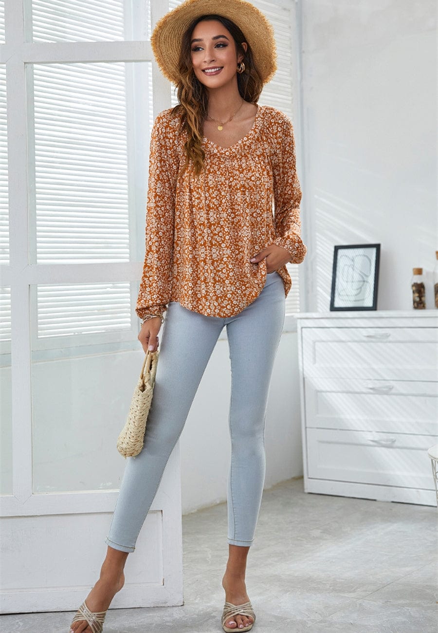 Blusa clásica con escote en V y estampado floral