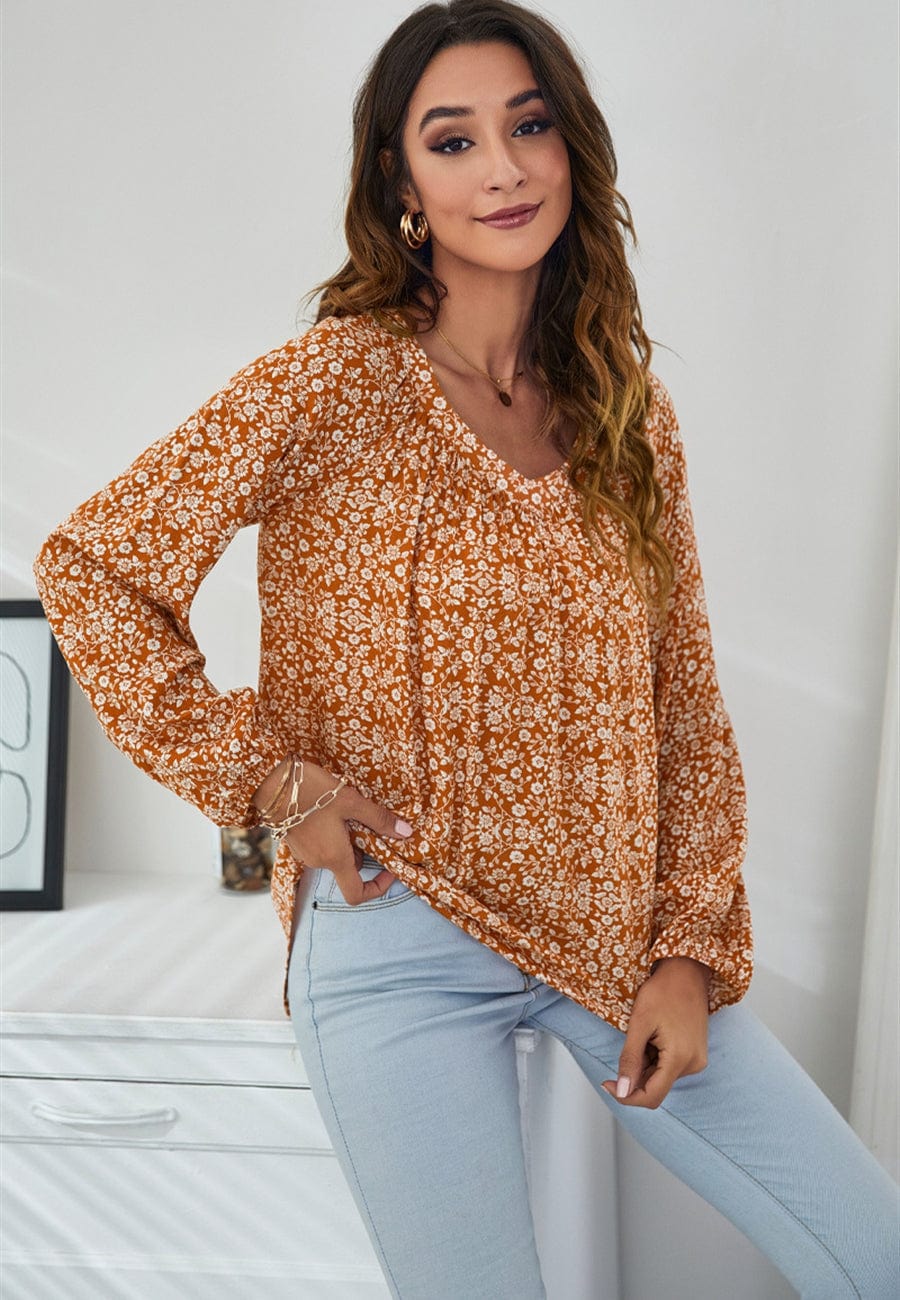 Blusa clásica con escote en V y estampado floral
