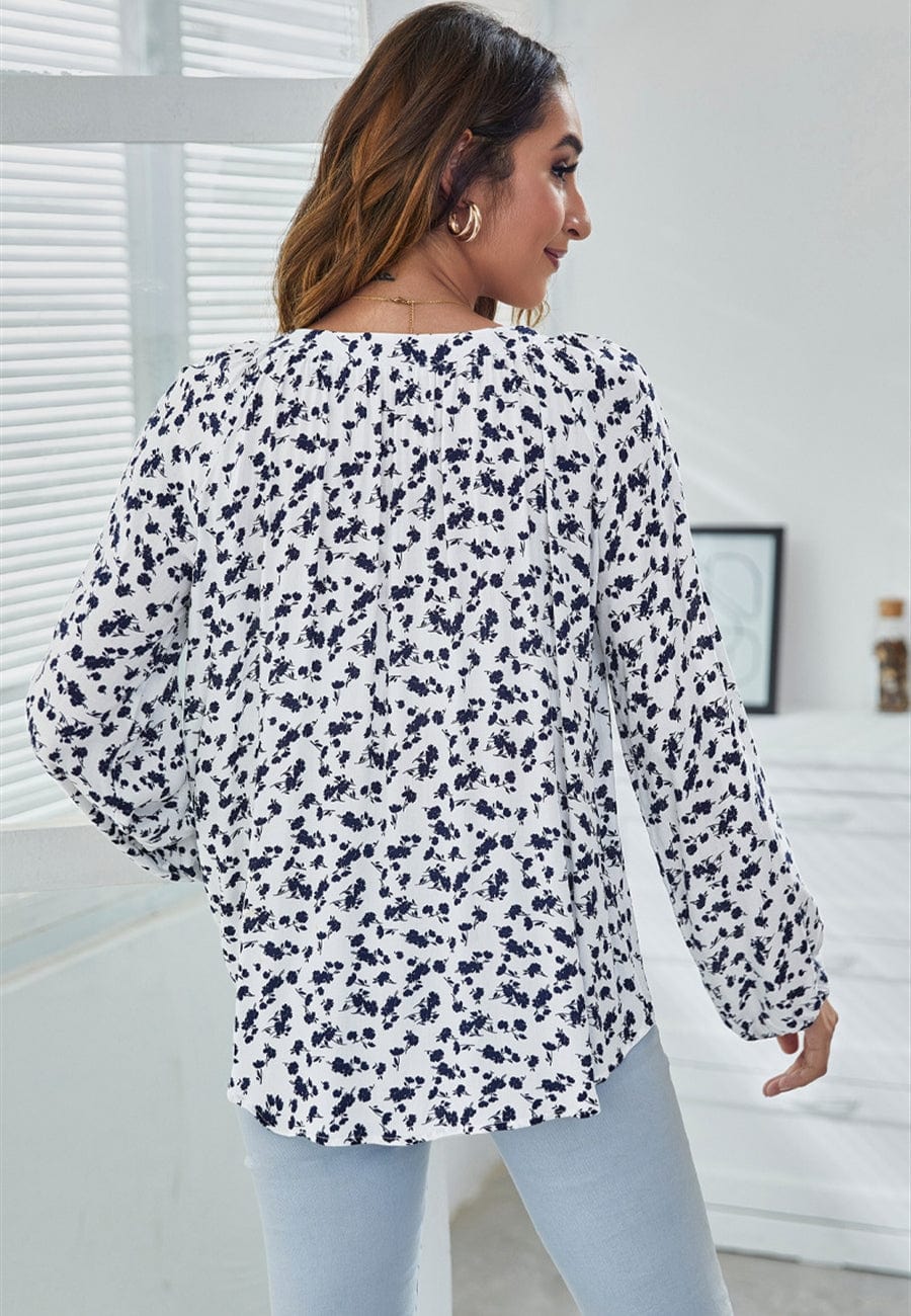 Blusa clásica con escote en V y estampado floral