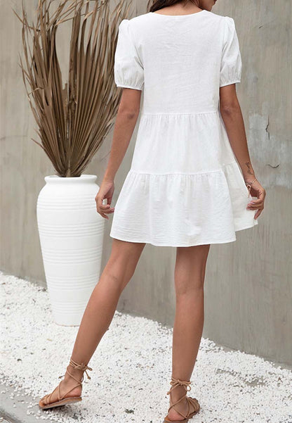 Vestido camisero con mangas abullonadas y escote en V