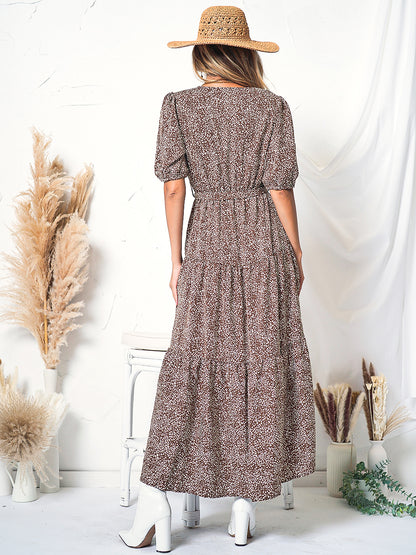 Vestido cruzado con mangas abullonadas y estampado 