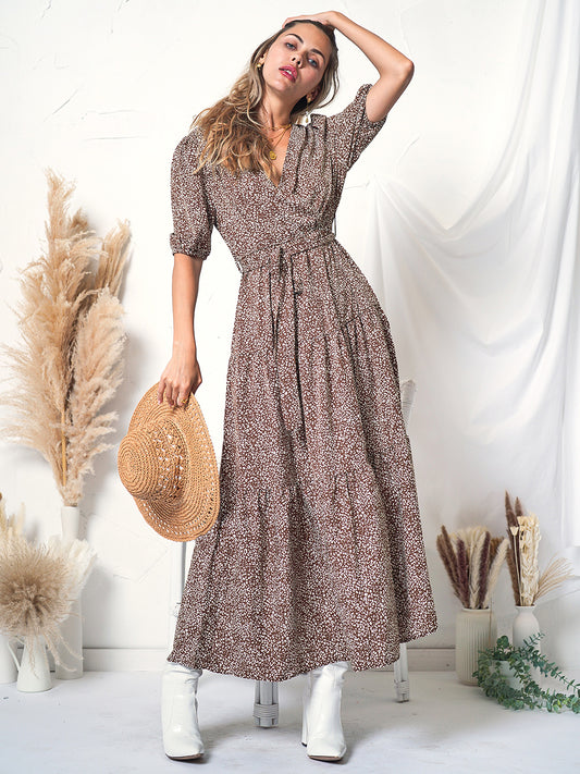 Vestido cruzado con mangas abullonadas y estampado 