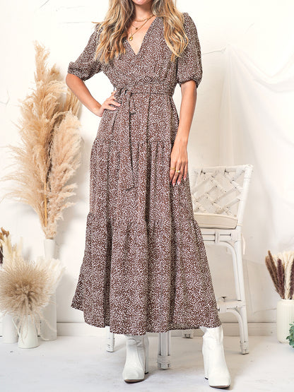 Vestido cruzado con mangas abullonadas y estampado 