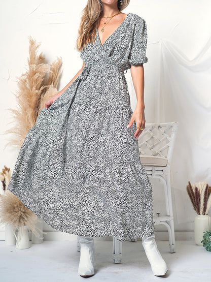 Vestido cruzado con mangas abullonadas y estampado 