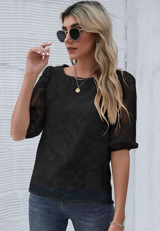 Blusa con mangas abullonadas y estampado floral
