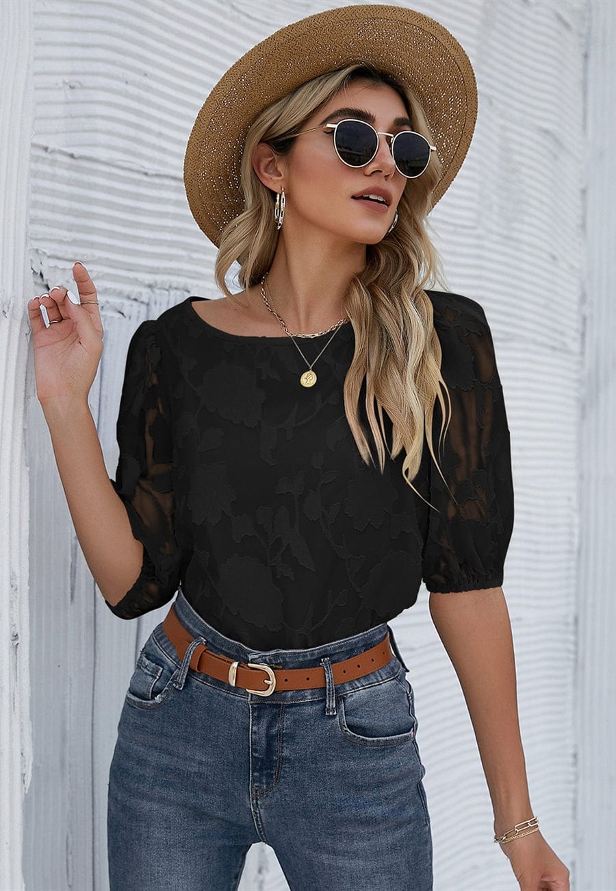 Blusa con mangas abullonadas y estampado floral