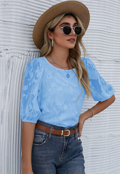 Blusa con mangas abullonadas y estampado floral