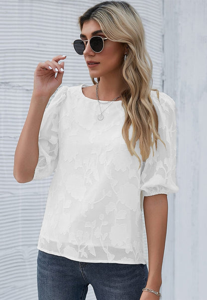 Blusa con mangas abullonadas y estampado floral