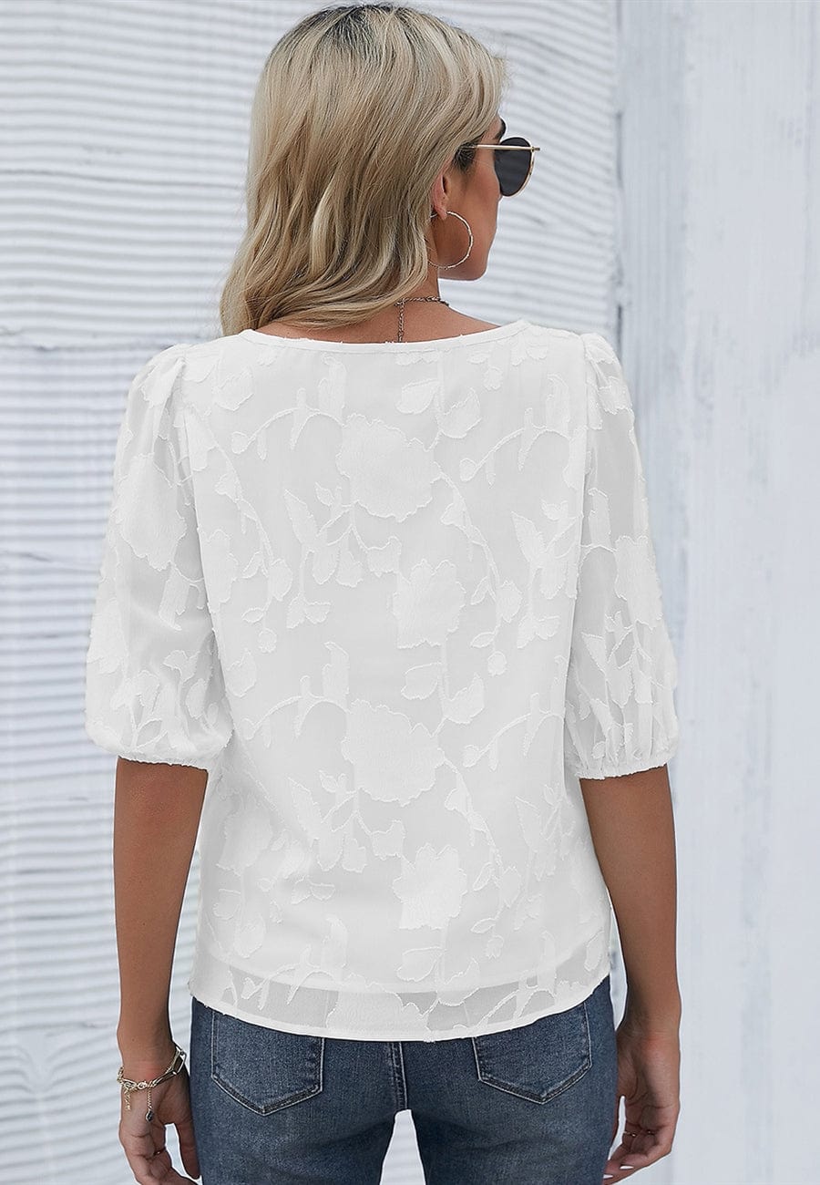 Blusa con mangas abullonadas y estampado floral
