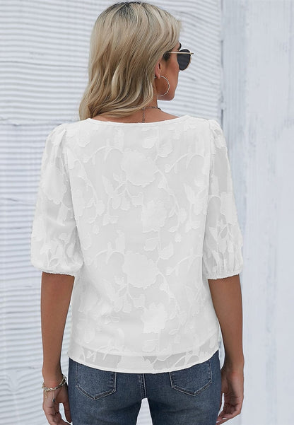 Blusa con mangas abullonadas y estampado floral
