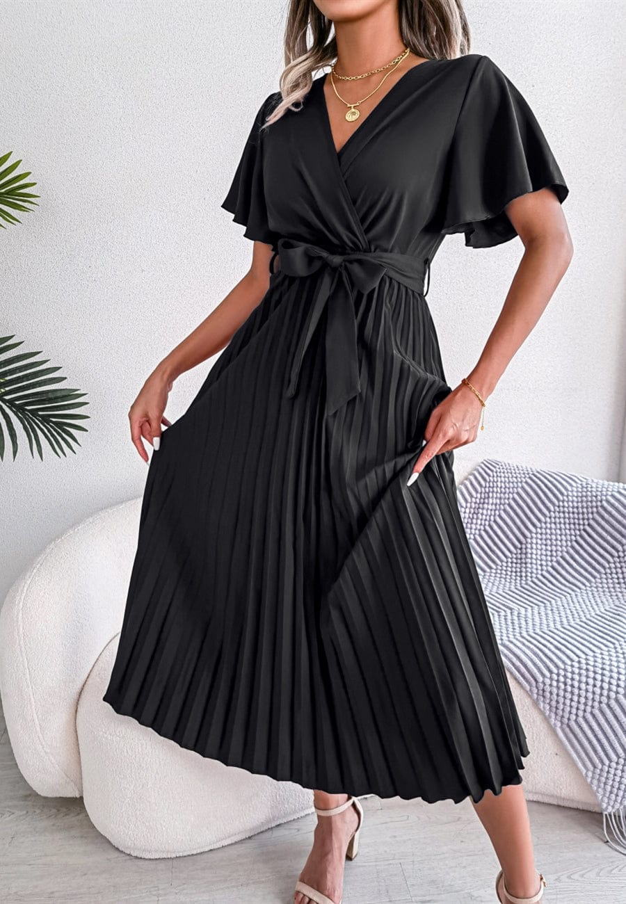 Vestido cruzado plisado con mangas abullonadas 